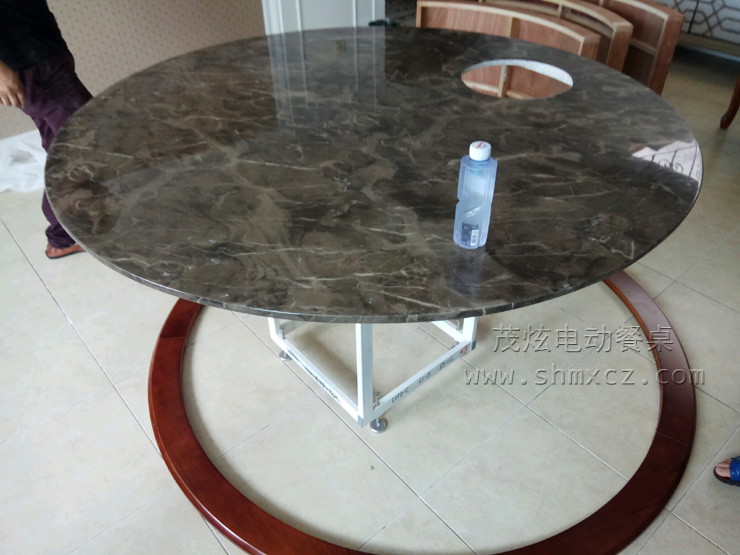 杭州私人住宅安装新中式大理石电动餐桌
